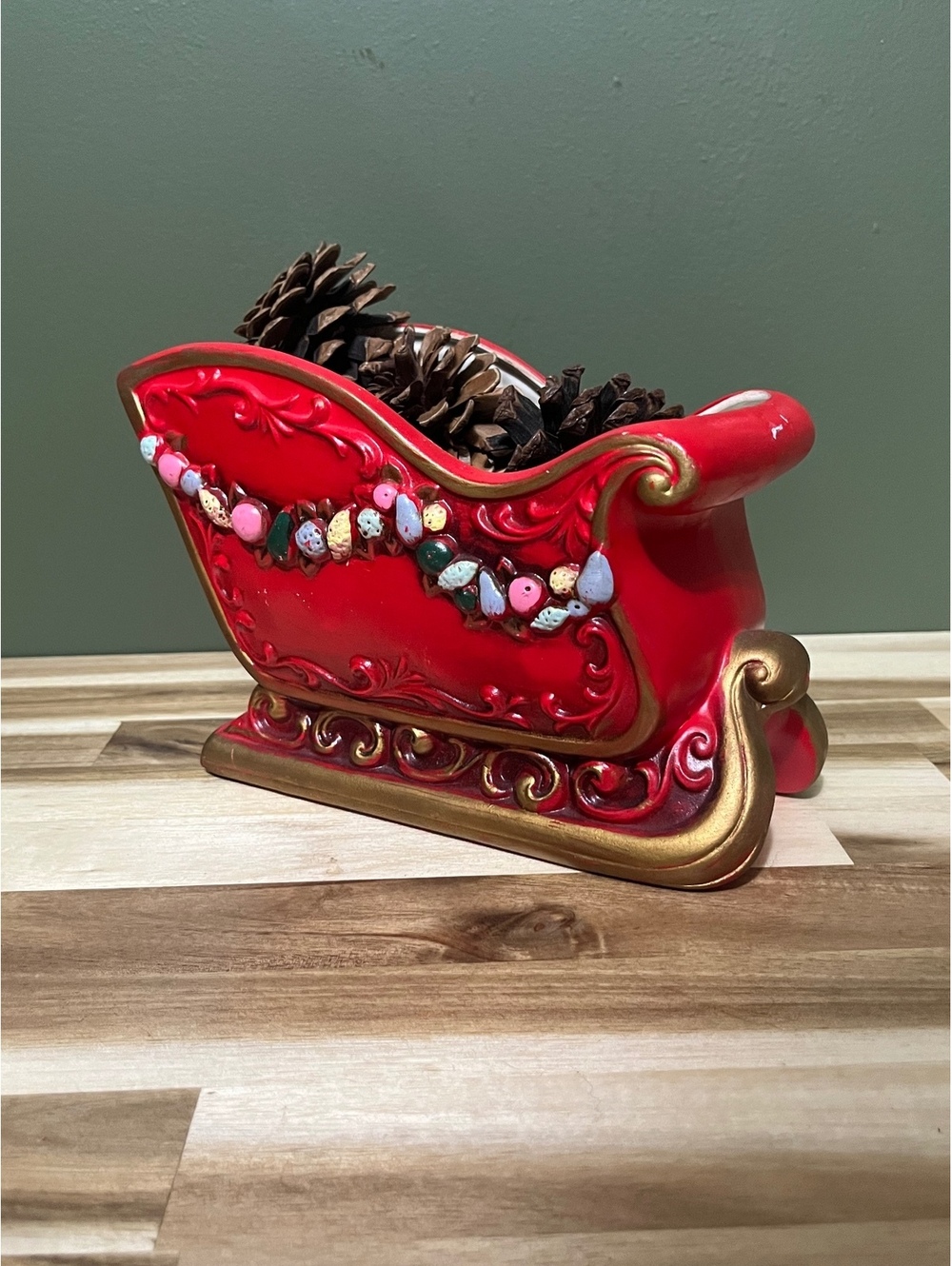 Vintage Red Ceramic Christmas Sleigh Planter with Decorative Fruit Garland